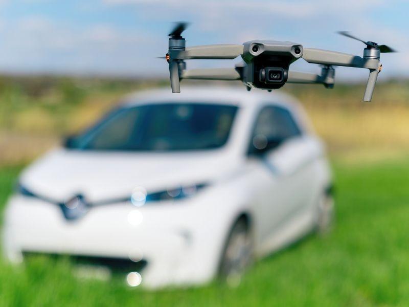 drone photographing a car